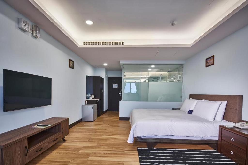 Menippe Hotel Каосюн Стая снимка